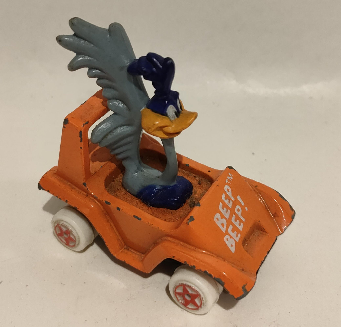 Beep Beep – In Auto Arancione