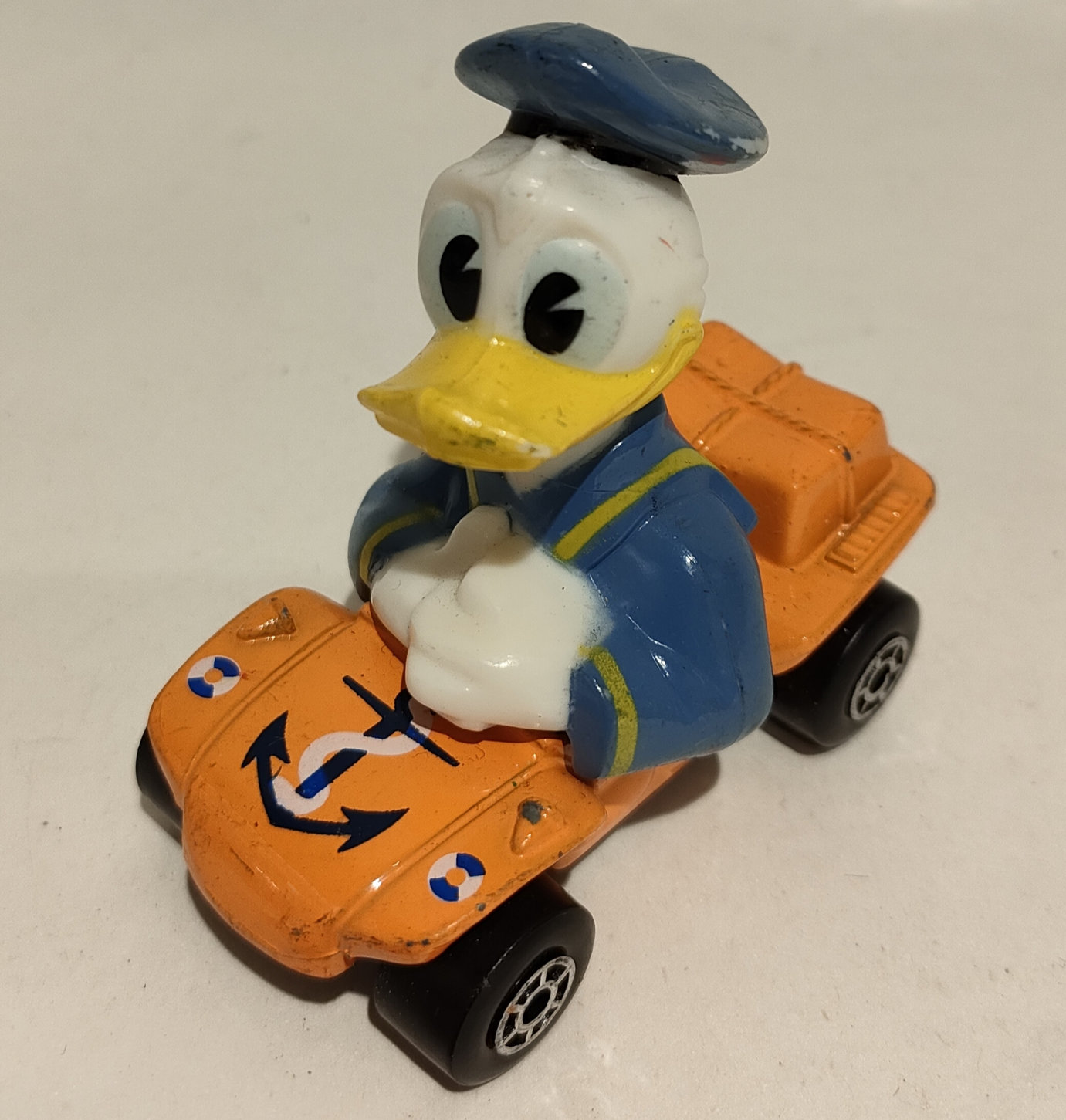 Paperino – In Auto Arancio – Scala 1:43