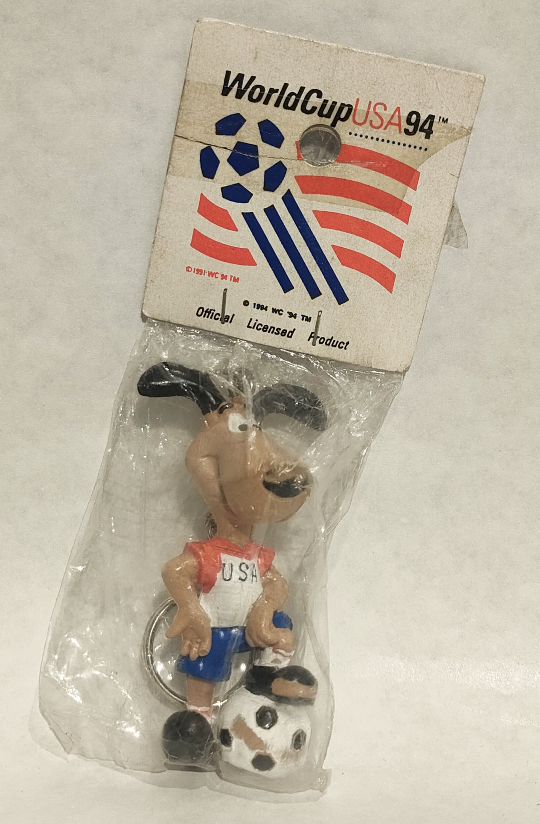 Portachiavi Striker – Mascotte Mondiali di Calcio 1994 USA – In Bister