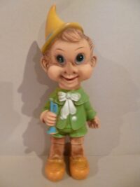 PINOCCHIO TROMBETTA VESTITO VERDE – 35CM